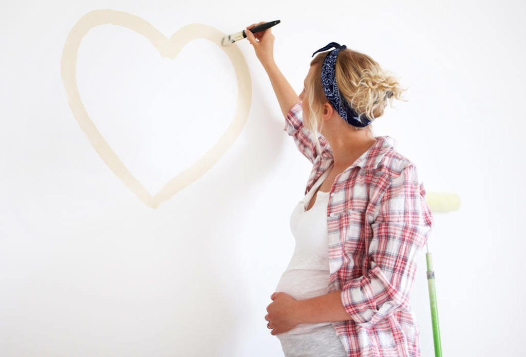 pregnant woman painting 